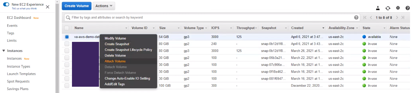 Created volume window in AWS, with the right-click menu expanded to display the Attach Volume option.